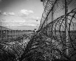 Privately operated prisons us ending barb wire